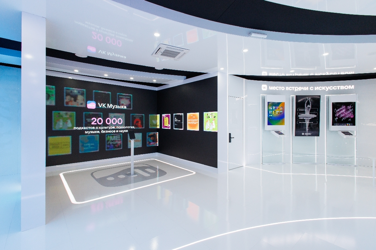 The VK Music zone: a tablet with the test on a stand in front of the LED wall